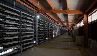 Massive Bitcoin mining farm with rows of operational devices