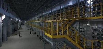A bustling mining farm in Mexico, showcasing rows of high-efficiency miners dedicated to BTC and ETH operations