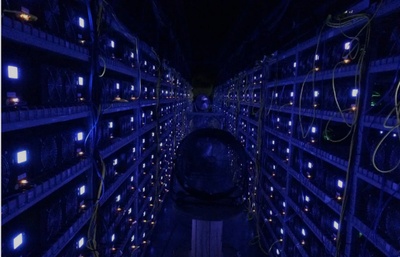 A wide angle view of a large mining farm with rows of miners running.